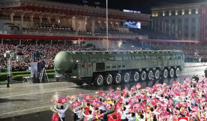 North Korea holds military parade, shows off new intercontinental missile