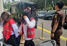 Indonesia charges 19 over baby trafficking Indonesia charges 19 over baby trafficking
