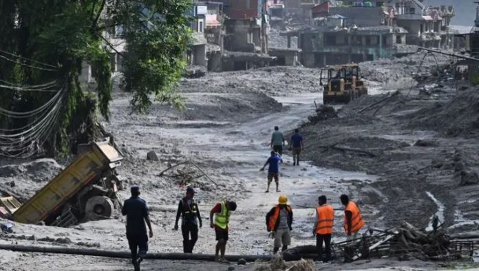 Rescuers dig into tunnel as missing toll from Nepal, China flood tops 3,000